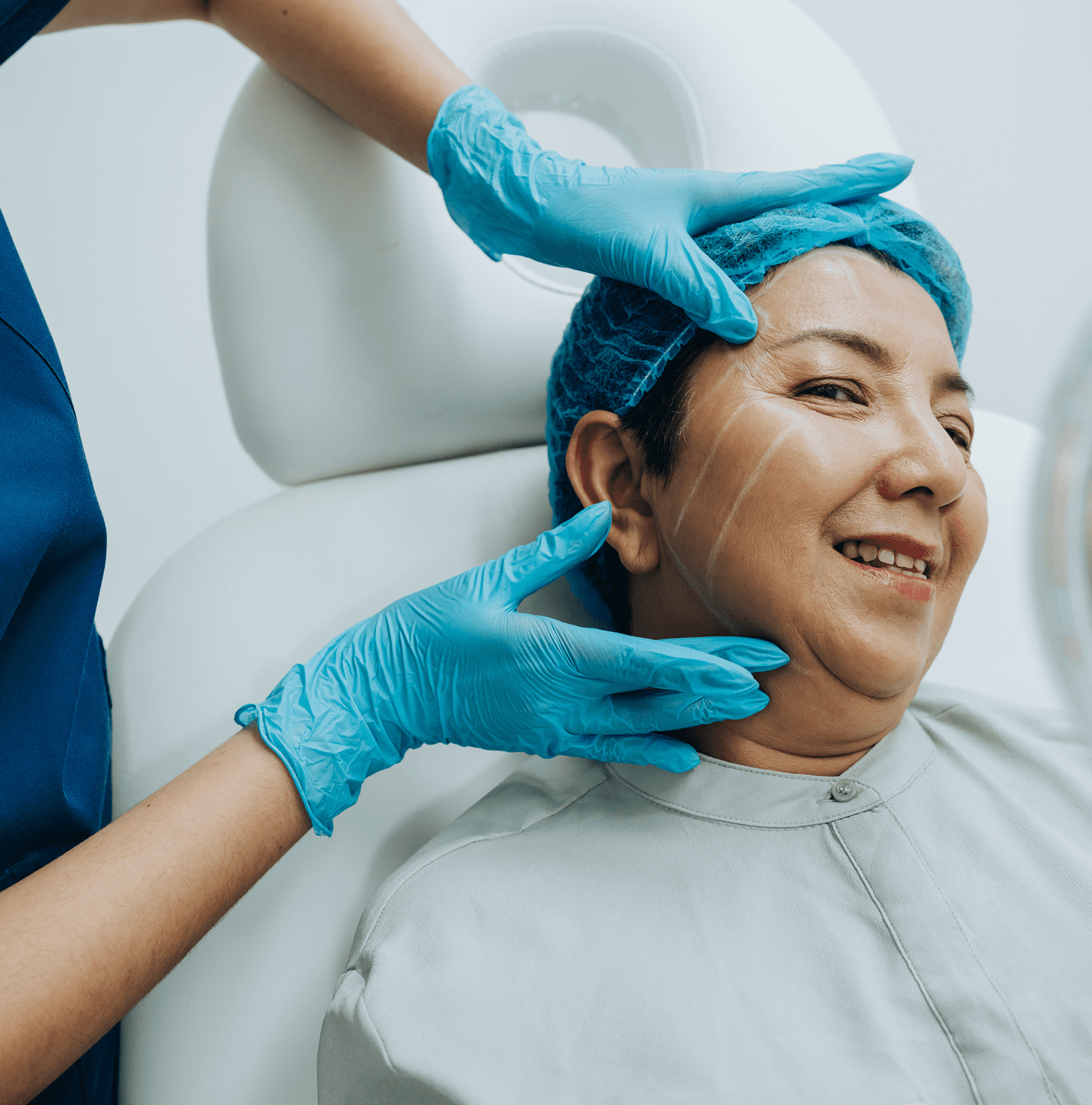 Medical professional examining woman's face