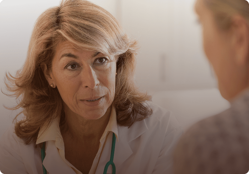 Doctor discusses health with patient